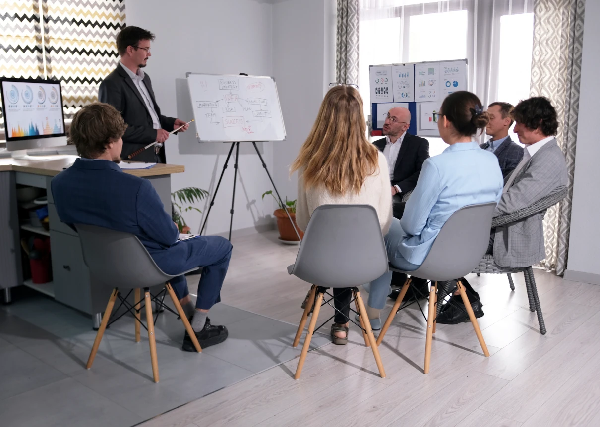 Group seated around presenter